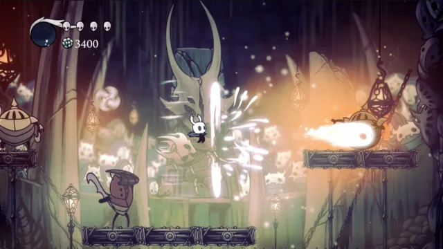 Hollow Knight — an attack lighting up a cavern encounter