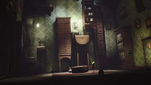 Little Nightmares — a washroom with a hanging light