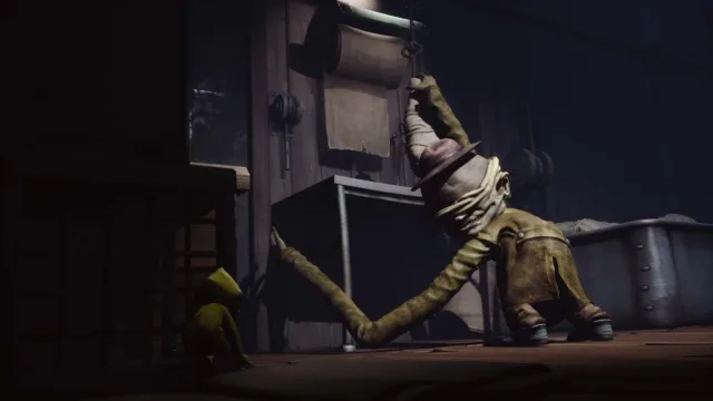 Little Nightmares — Six hiding beside a large bandaged figure