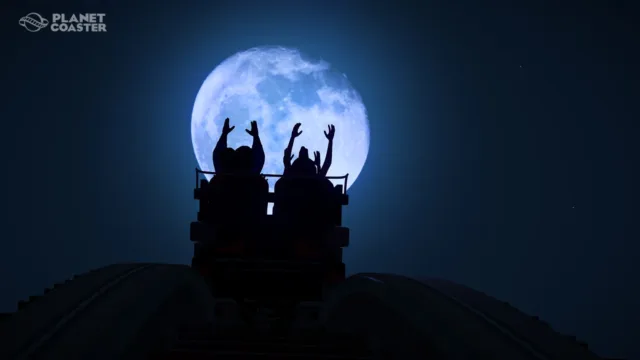 Planet Coaster — a coaster silhouetted against the moon