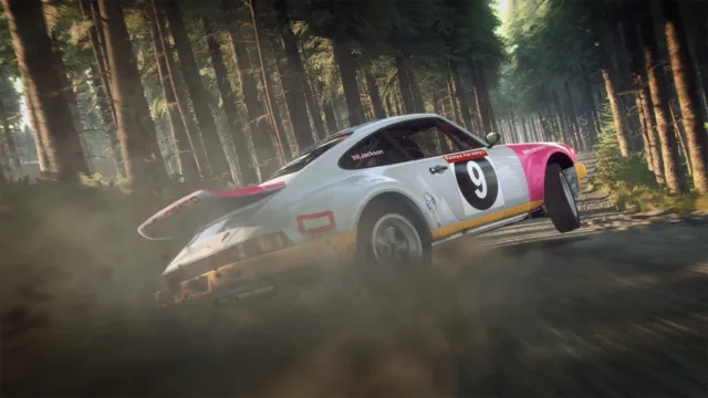 DiRT Rally 2.0 — a rally car sliding through woodland