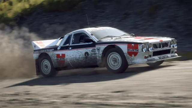 DiRT Rally 2.0 — a rally car throwing dust on a loose surface