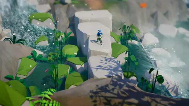 Lonely Mountains: Downhill — a rider crossing a rocky waterfall area