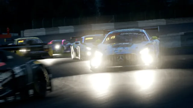 Assetto Corsa Competizione — race cars running under bright headlights