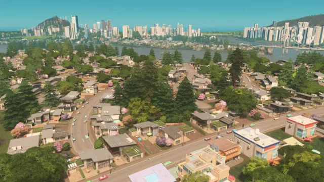 Cities: Skylines — PC screenshot: A developed city with parks and roads