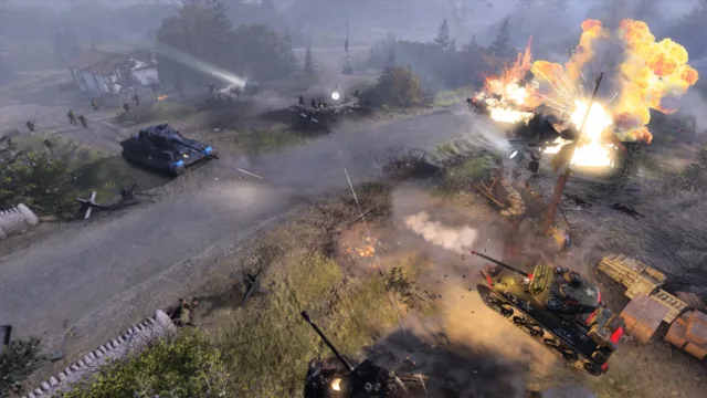 Company of Heroes 3 — PC screenshot: Armored vehicles in a damaged town