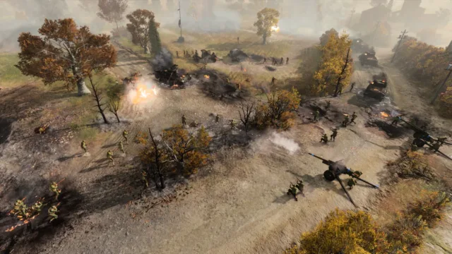 Company of Heroes 3 — PC screenshot: Tanks advancing through a rural battlefield