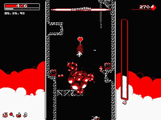 Downwell — PC screenshot: Moving past blocks beside a red pool