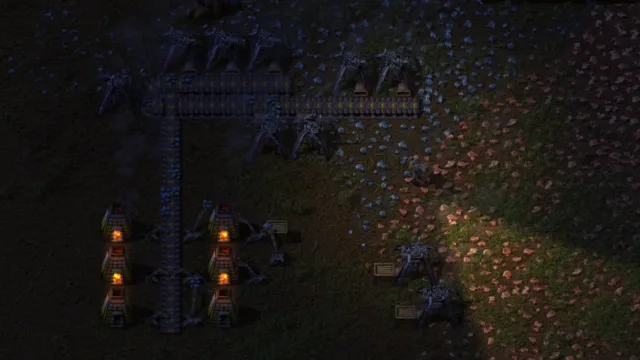 Factorio — PC screenshot: An industrial base operating at night