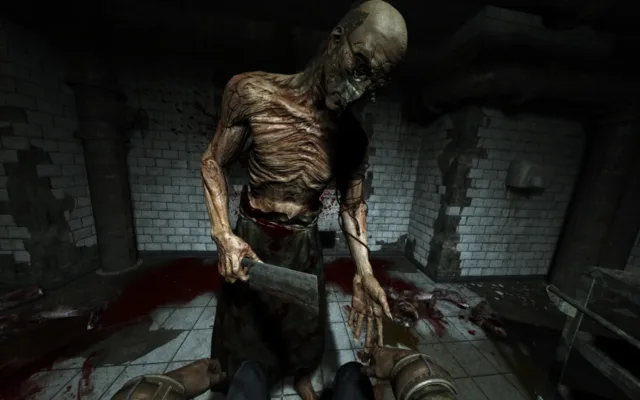 Outlast — PC screenshot: An unsettling figure inside the asylum